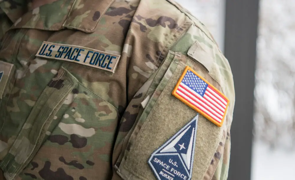 Space Force Staff Sgt. David Diehl II, 436th Communications Squadron noncommissioned officer in charge of wing cybersecurity, displays his new uniform Space Force tapes and service branch patch at Dover Air Force Base, Del., Feb. 12, 2021.