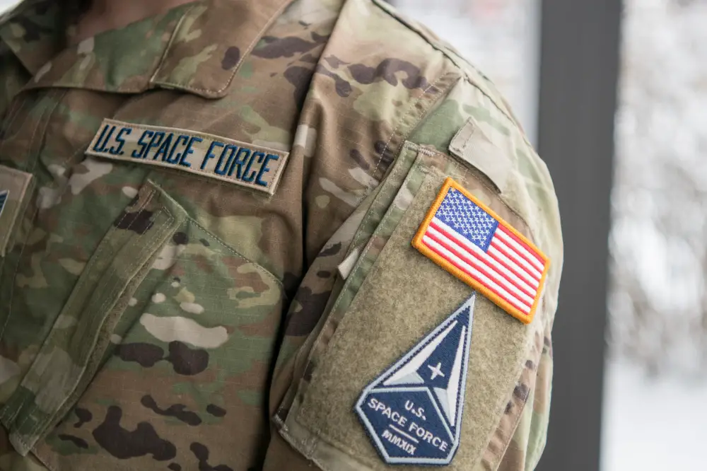 Space Force Staff Sgt. David Diehl II, 436th Communications Squadron noncommissioned officer in charge of wing cybersecurity, displays his new uniform Space Force tapes and service branch patch at Dover Air Force Base, Del., Feb. 12, 2021.