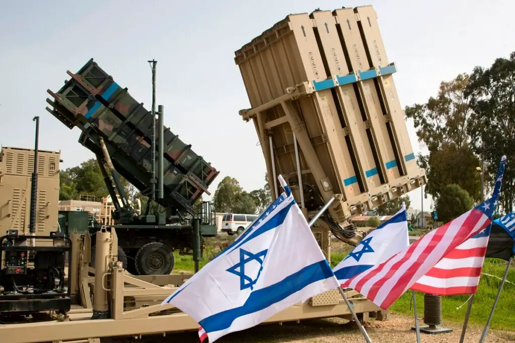An Israeli Iron Dome anti-rocket system, right, and an American Patriot missile defense system are shown during a joint U.S.-Israel military exercise on March 8, 2018.