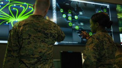 Marines with Marine Corps Forces Cyberspace Command at the cyber operations center at Lasswell Hall aboard Fort Meade, Maryland, 2020.