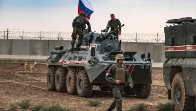 Russian troops with military vehicles are seen on patrol outside the town of Darbasiyah in Syria's northeastern Hasakeh province, on the border with Turkey, Novemer 1, 2019