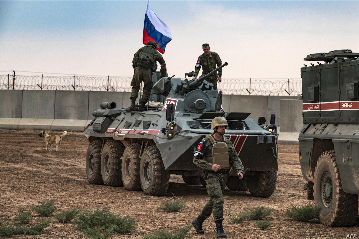 Russian troops with military vehicles are seen on patrol outside the town of Darbasiyah in Syria's northeastern Hasakeh province, on the border with Turkey, Novemer 1, 2019