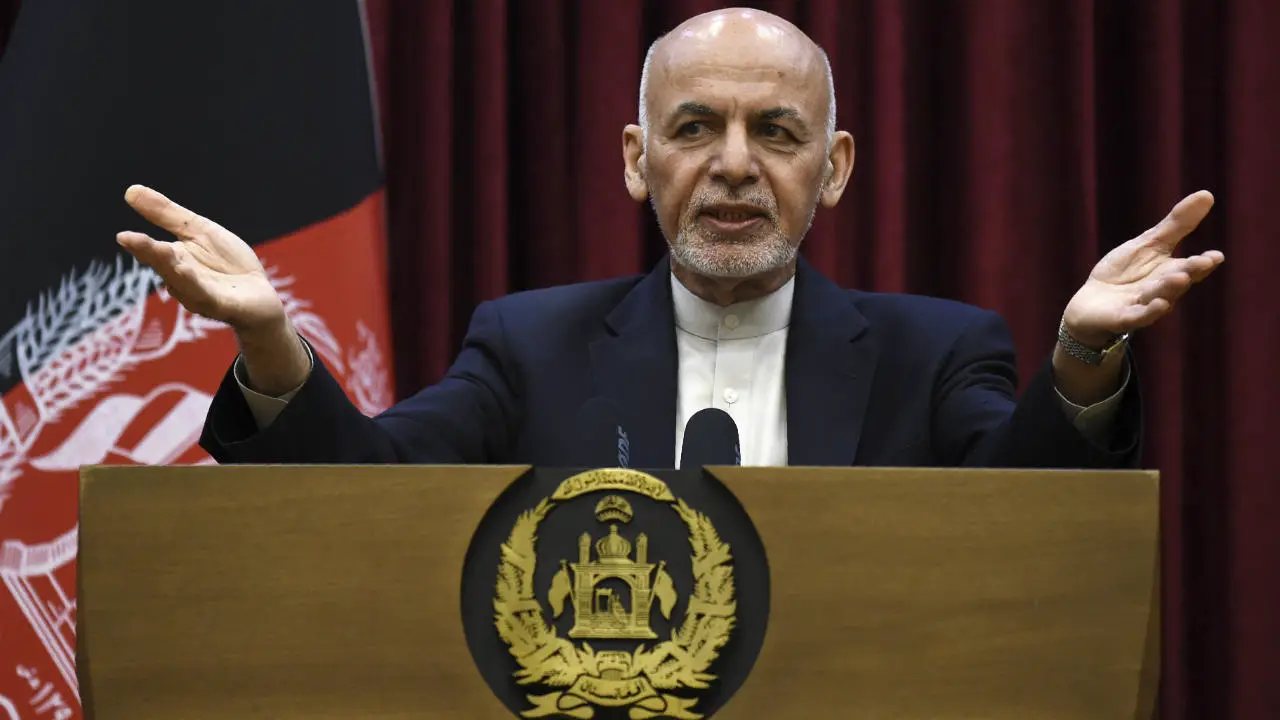 Afghan President Ashraf Ghani gestures as he speaks during a press conference at the presidential palace in Kabul on March 1, 2020