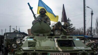 Ukrainian soldiers ride armored vehicles to Debaltseve, eastern Ukraine, Donetsk region, on February 1, 2015