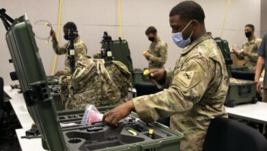 An Electronic Warfare Specialist in 1st Armored Division inventories assets for the VMAX dismounted Electronic Warfare system