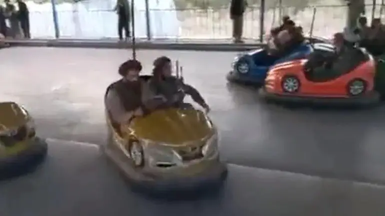 Viral Videos Show Taliban Riding Bumper Cars, Trying Gym Equipment