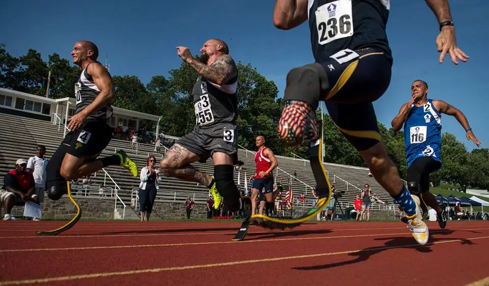 Staff Sgt. Rey Edenfield (far right), an Air Force wounded warrior athlete, sprints toward the finish line with fellow competitors at the 2015 Department Of Defense Warrior Games
