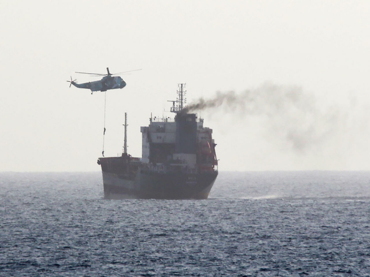 Iranian forces boarding a tanker in international waters in the Gulf of Oman