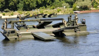 Amphibious bridging vehicles