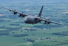 An AC-130J Ghostrider assigned to the 4th Special Operations Squadron, Hurlburt Field, Fla., soars over interior Wisconsin during EAA AirVenture Oshkosh 2021, July 30, 2021.