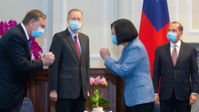 Taiwan’s President Tsai Ing-wen gestures to a US official as US Secretary of Health and Human Services Alex Azar