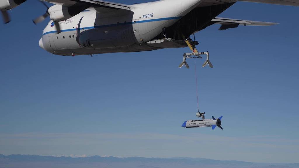 X-61 Gremlin drone and a C-130 Hercules