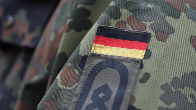German flag pictured on soldier's uniform