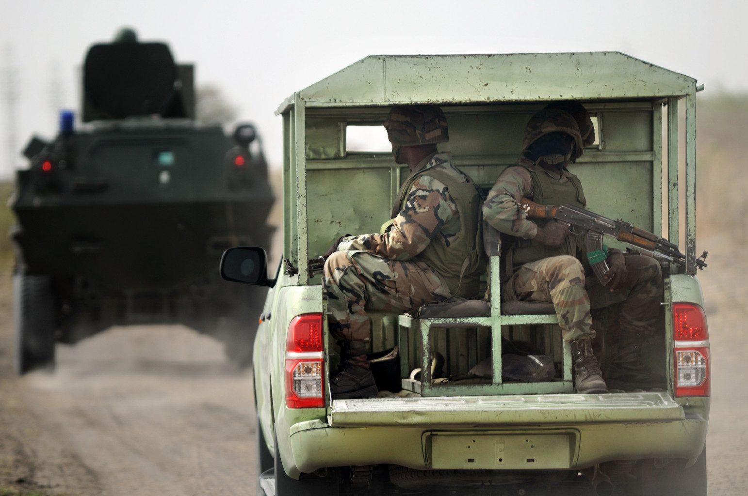 Nigerian soldiers patrolling Borno state near a former Boko Haram camp