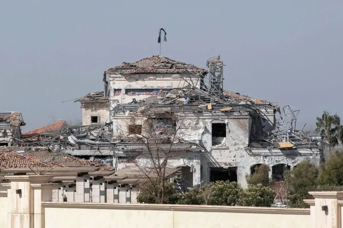 A picture taken on March 13, 2022, shows a view of a damaged building after an overnight attack in Arbil, the capital of the northern Iraqi Kurdish autonomous region