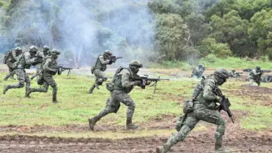 Taiwanese soldiers simulate fending off an attempted invasion