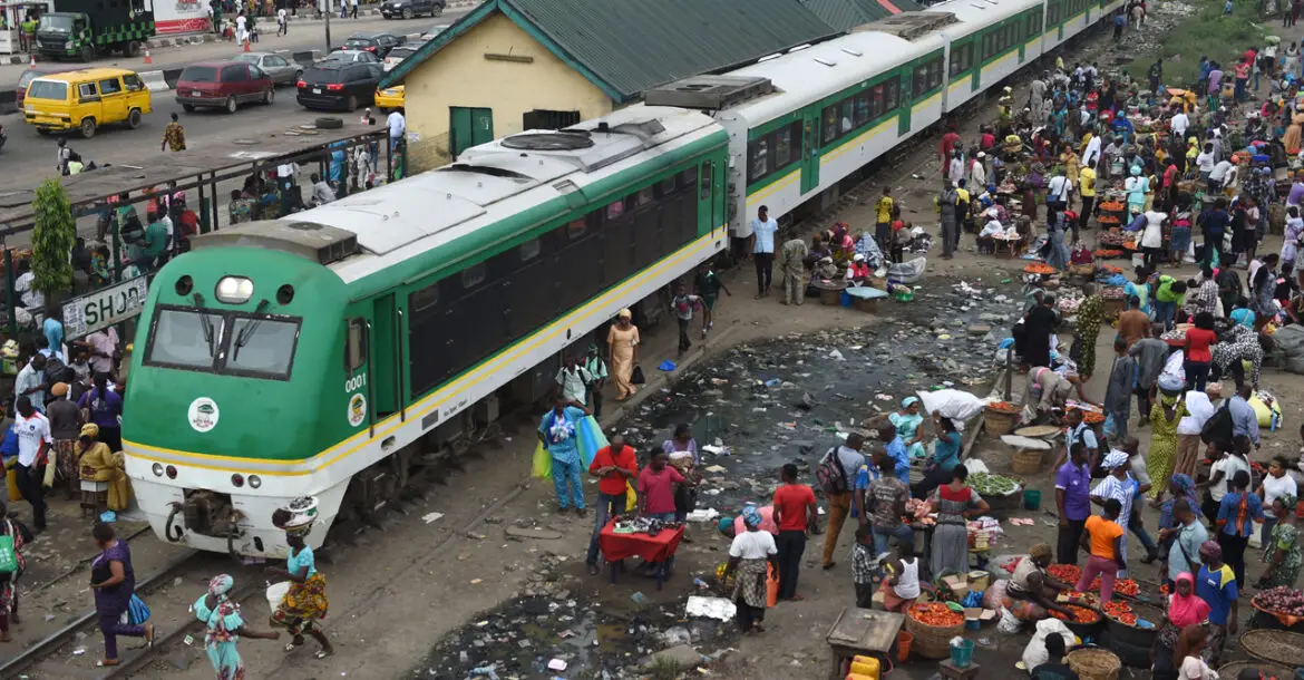 Passengers board a train in Nigeria