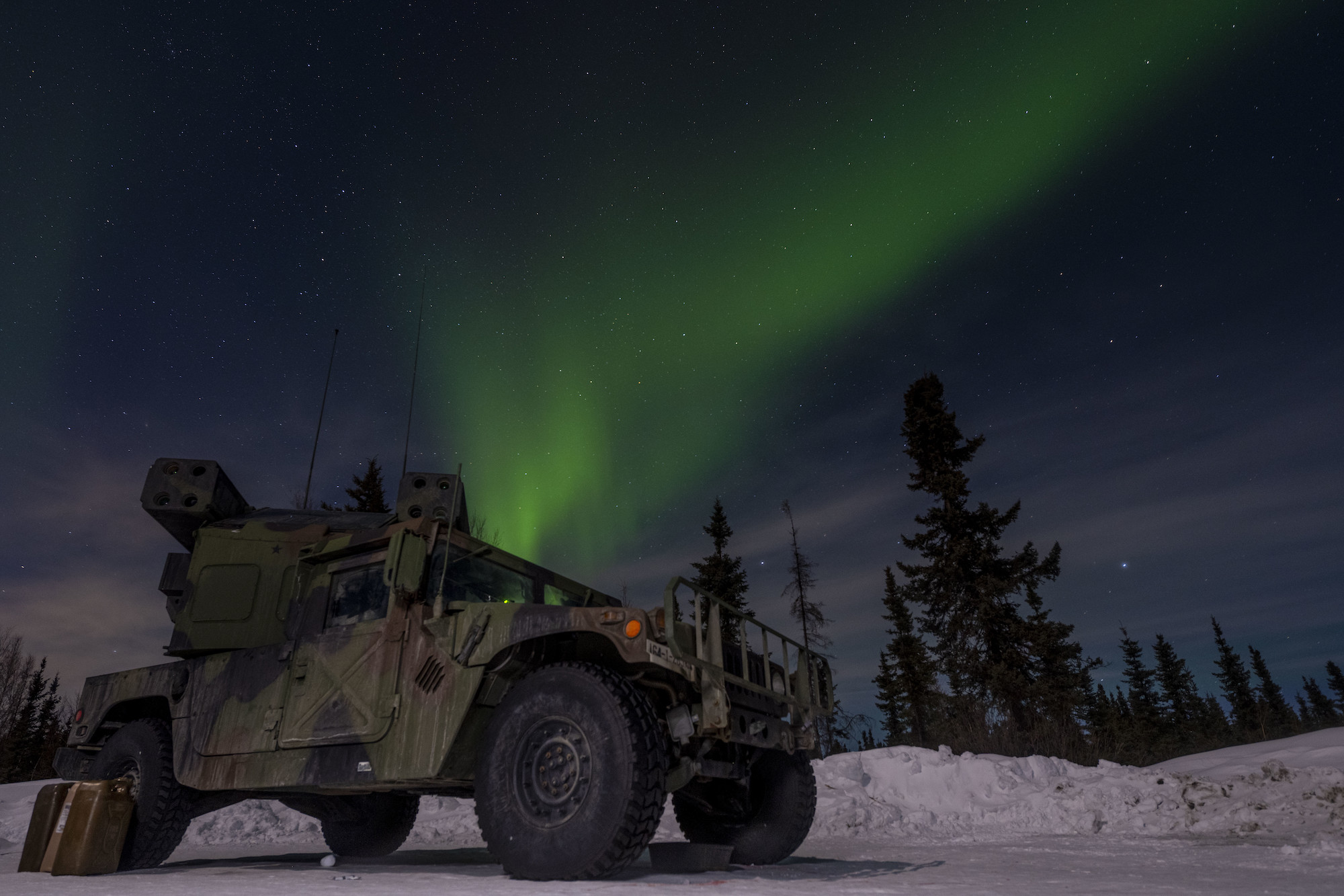 The northern lights glow above an Avenger Air Defense System