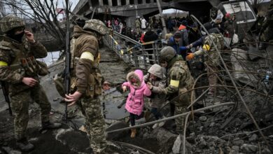 Ukrainians fleeing Russian shelling in Irpin