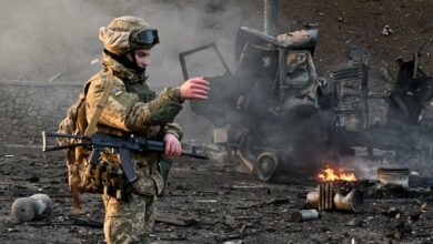 Ukrainian service member seen at the site of fighting with a Russian raiding group