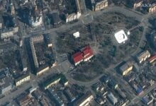US private company Maxar satellite image taken on March 14, 2022 shows the word ‘children’ was painted in large Russian script on the ground outside the Mariupol Drama Theater