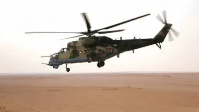 A Russian Mil Mi-24 "Hind" attack helicopter flying in the eastern Syrian region of Deir Ezzor