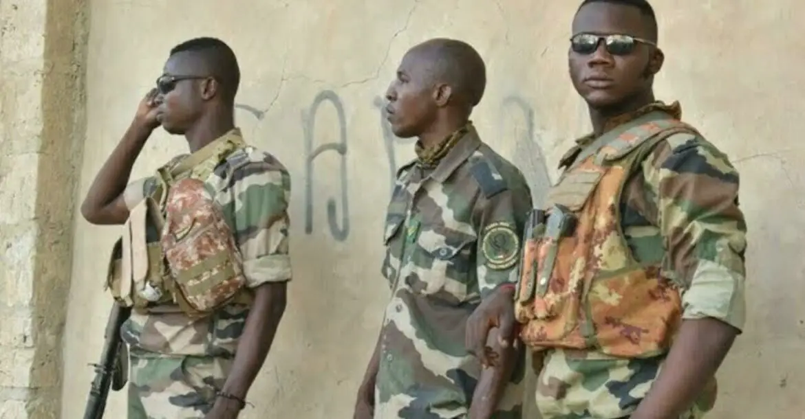 Malian Defense Forces soldiers look on in Timbuktu