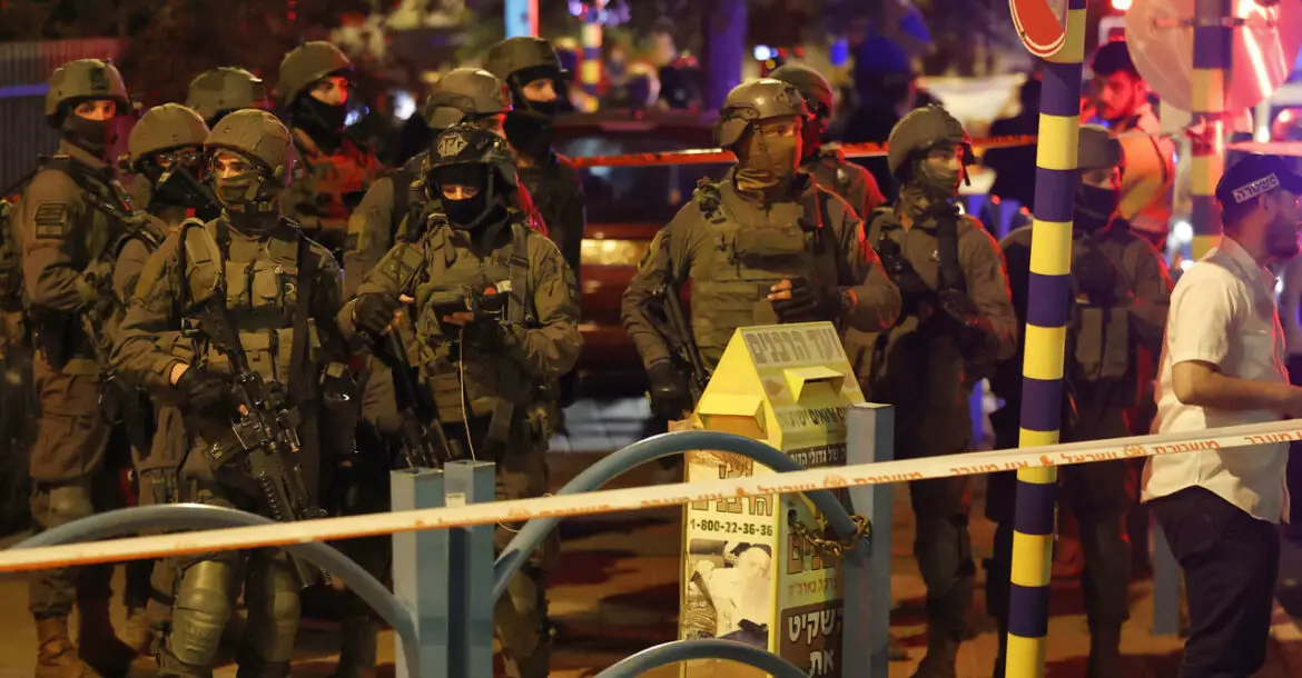 Israeli security forces are pictured at the scene of an attack