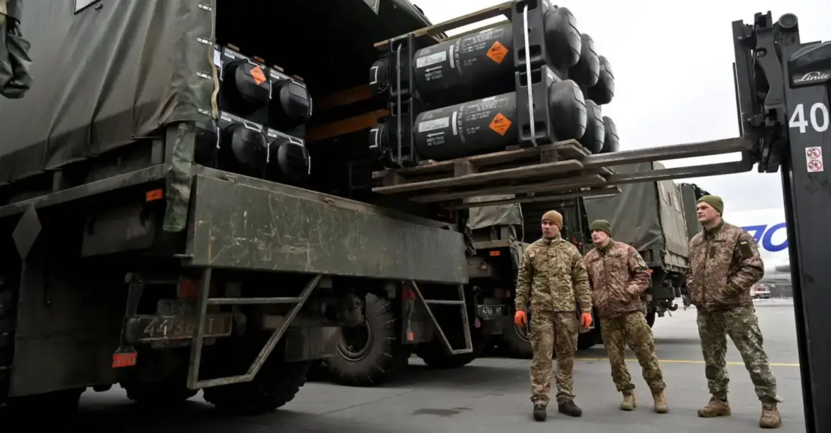 Ukrainian troops load a truck with US-made Javelins anti-tank missiles
