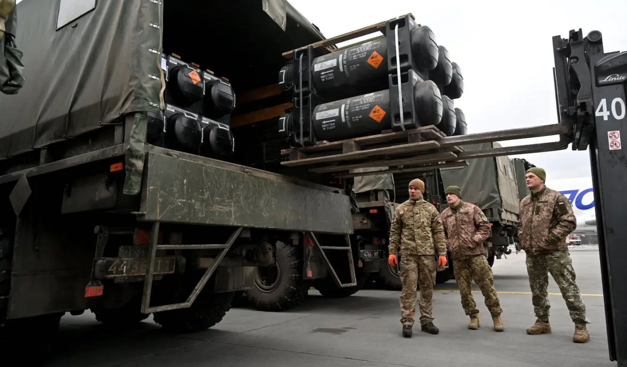 Ukrainian troops load a truck with US-made Javelins anti-tank missiles