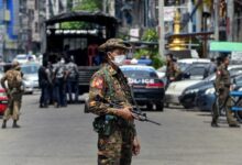 A soldier stands guard in Yangon, Myanmar
