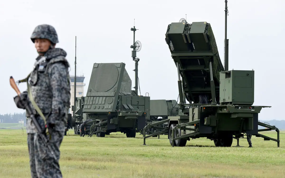 Soldiers from the Japan Air Self-Defense Force set up PAC-3 surface-to-air missile launch systems