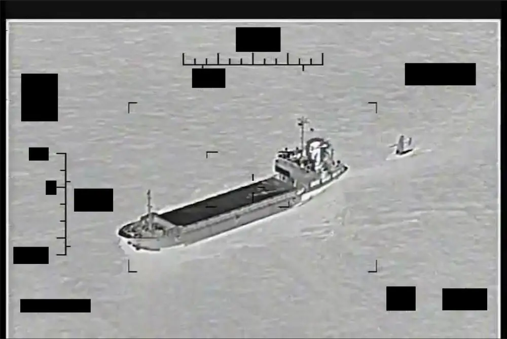 Screenshot of a video showing support ship Shahid Baziar, left, from Iran's Islamic Revolutionary Guard Corps Navy unlawfully towing a Saildrone Explorer unmanned surface vessel in international waters of the Arabian Gulf, Aug. 30.