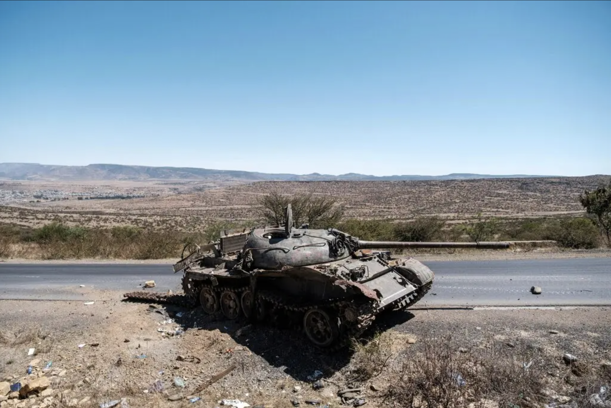 A damaged tank stands on a road north of Mekele, the capital of Tigray