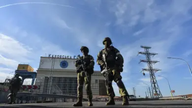 Russian servicemen patrolling at the Kakhovka Hydroelectric Power Plant, Kherson