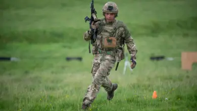 A soldier from 5th Battalion, The Rifles, runs the obstacle course
