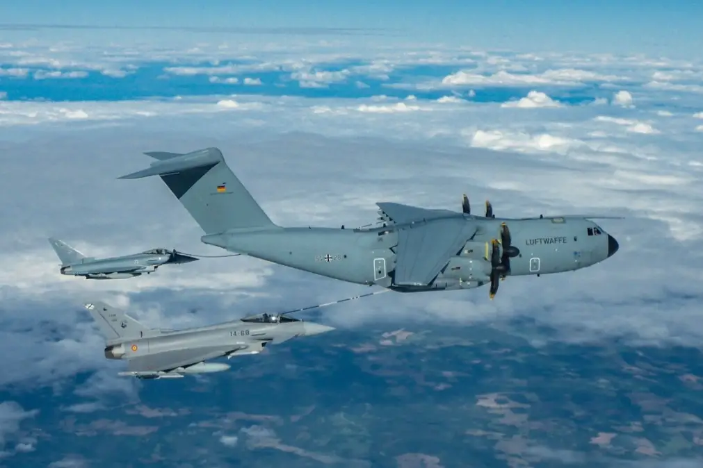 Spanish-German Eurofighters and German A-400M conducts tactical air-to-air refueling.