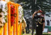 A file photo shows then-Commanding-in-Chief Eastern Command of Indian Army Lieutenant General Anil Chauhan salutes during a ceremony to mark “Vijay Diwas"