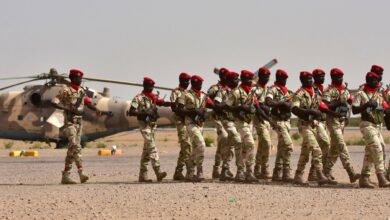 Soldiers from Niger's National Guard march on the tarmac in Diffa, southeastern Niger