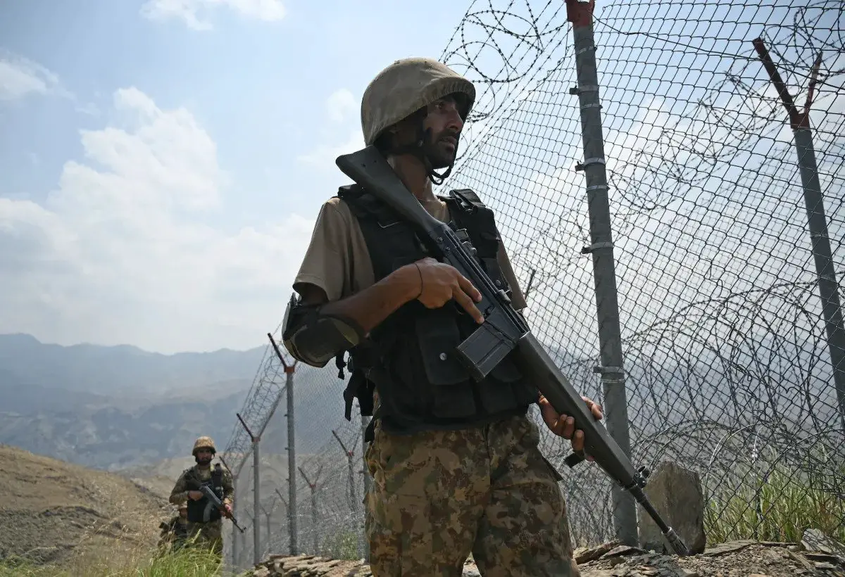 Pakistani troops patrol along the Afghanistan border at Big Ben post in Khyber district in Khyber Pakhtunkhwa province