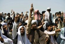 Taliban supporters gather to celebrate the US withdrawal from Afghanistan in Kandahar