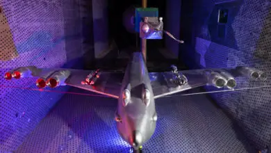 GBU-38 bomb mounted on B-52H Stratofortress model in a wind tunnel.