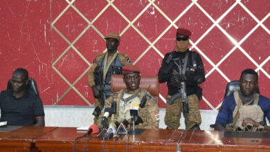 Burkina Faso's new self-proclaimed leader captain Ibrahim Traore, center, attends a meeting in Ouagadougou