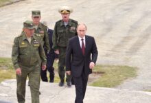 Russian President Vladimir Putin with army officials