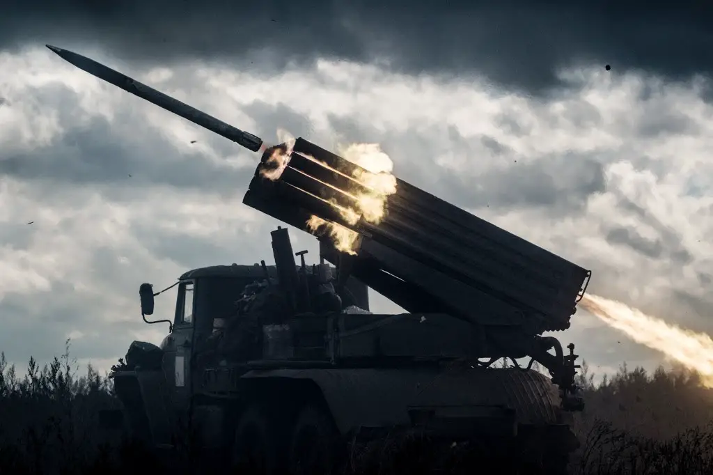 rocket is launched from a truck-mounted multiple rocket launcher towards Russian positions in Kharkiv