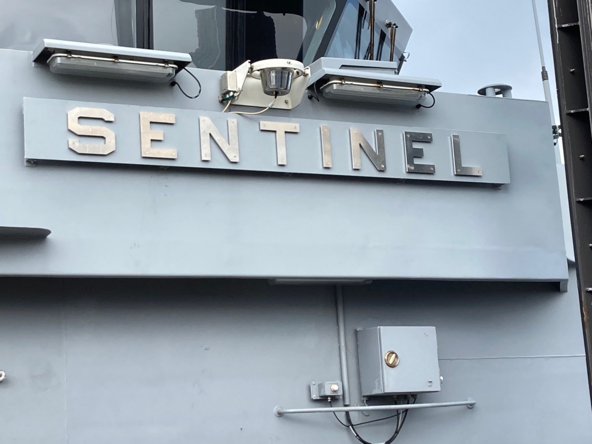 Sentinel's nameplate.