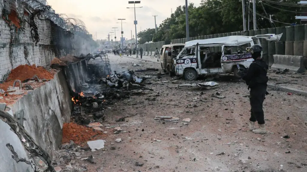 A Somali soldier at the scene of car bombings in Mogadishu