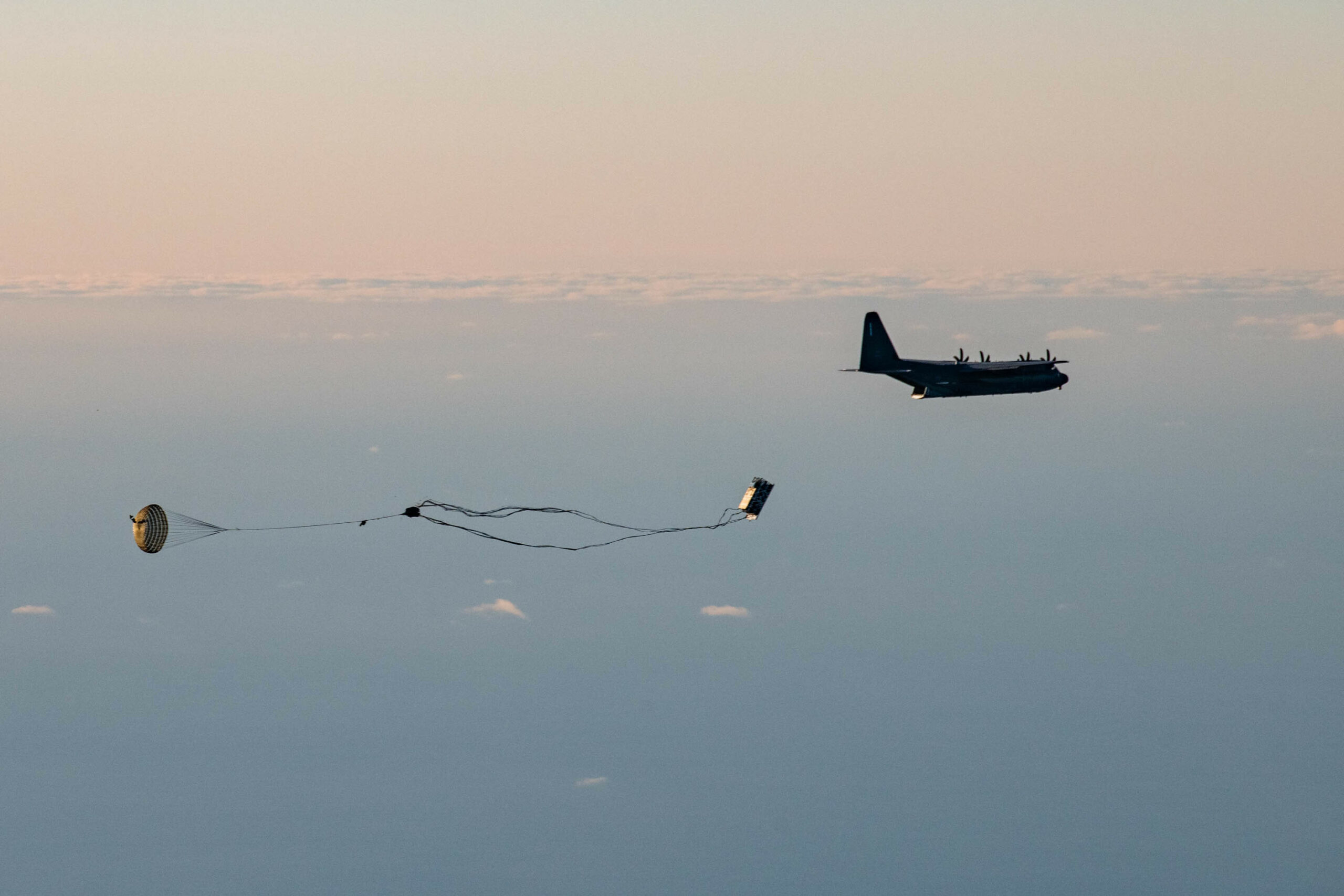A Rapid Dragon missile falls from the cargo hold of an MC-130J Commando II.