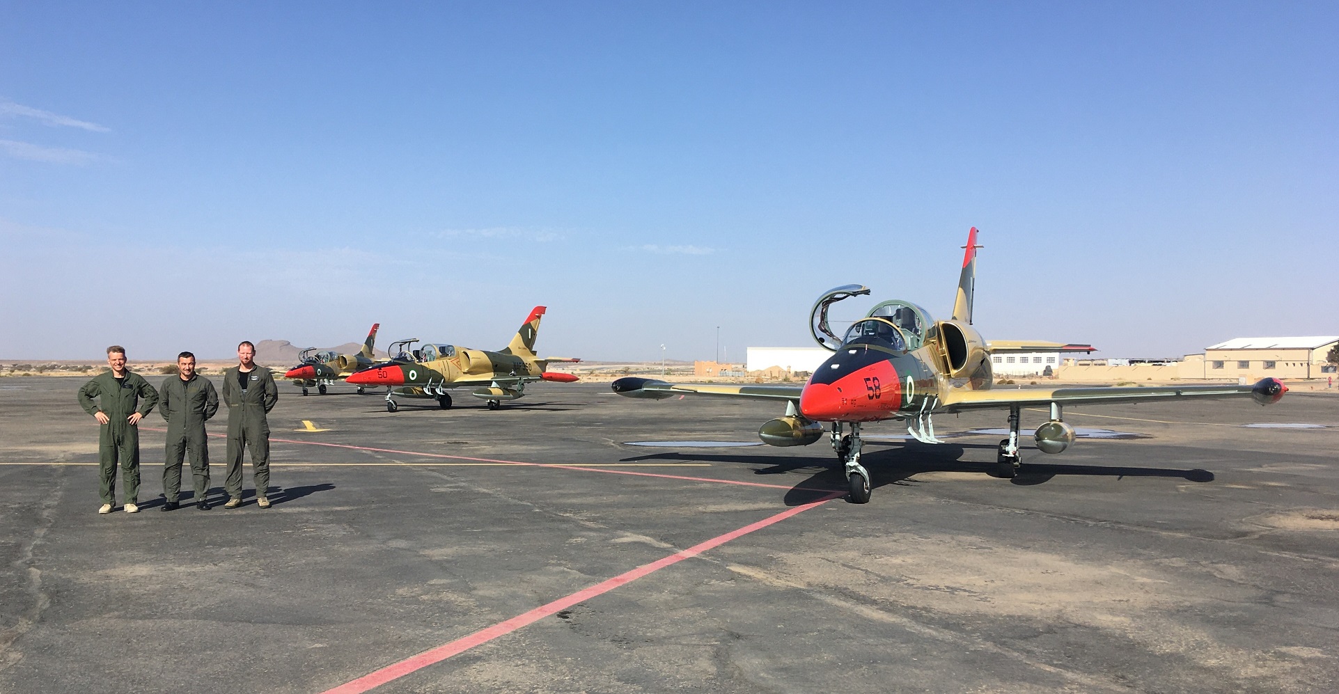 Test pilots deliver three modernized L-39ZA Albatros to Nigeria.