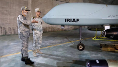Commander-in-Chief of the Iranian Army Major General Abdolrahim Mousavi (left) and Armed Forces Chief of Staff Major General Mohammad Bagheri visit an underground drone base, in an unknown location in Iran